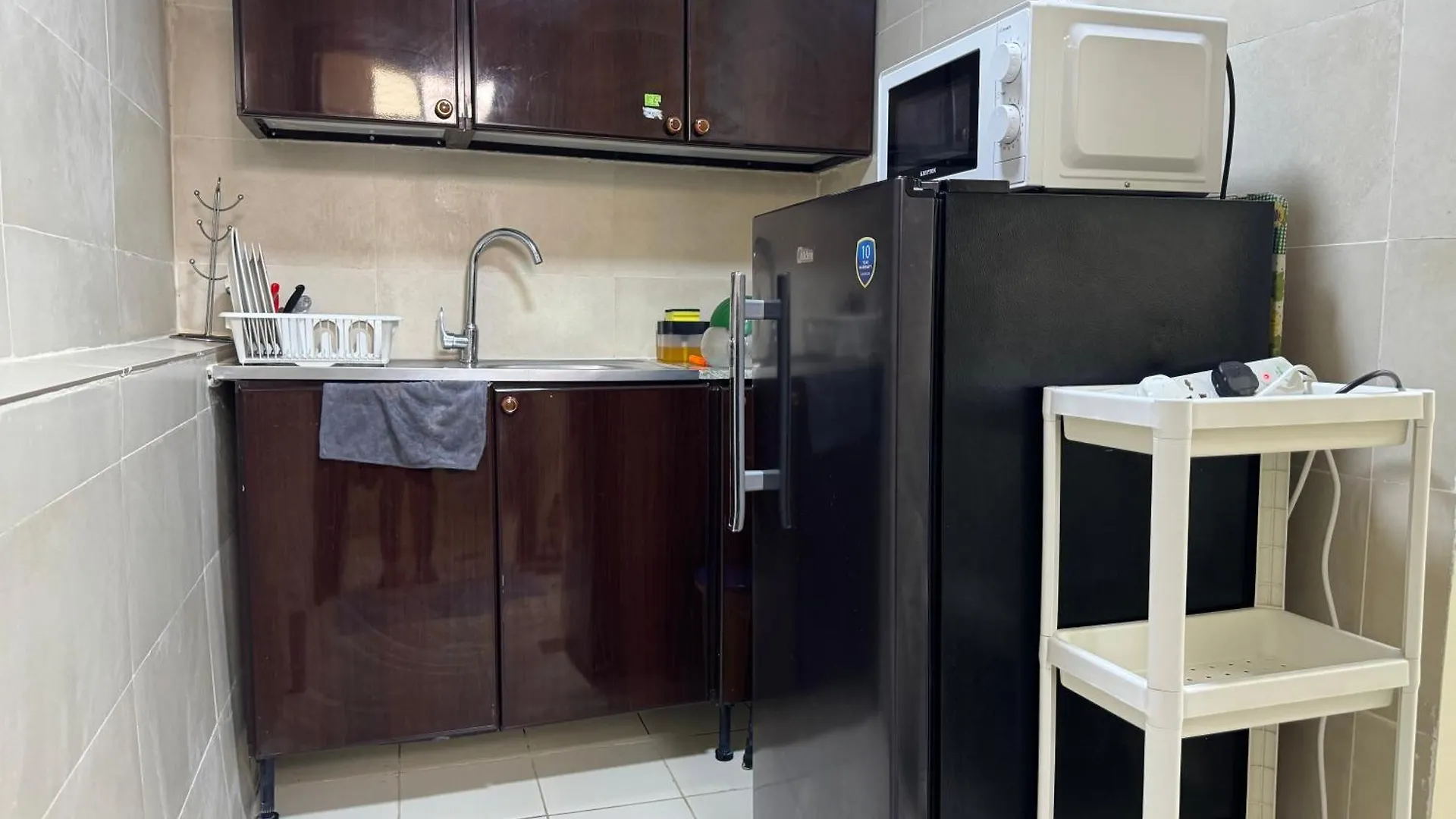 Quarto em Acomodações Particulares Backpackers Place Apartamento Abu Dhabi